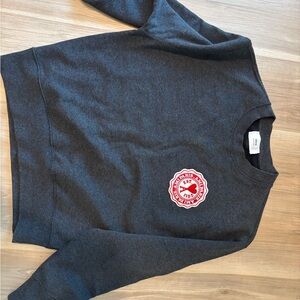 Ami Dark Gray Crewneck Sweatshirt with Red Crest Patch